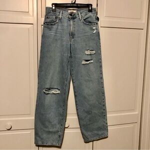 Distressed Levi’s  Large E Blue Jeans